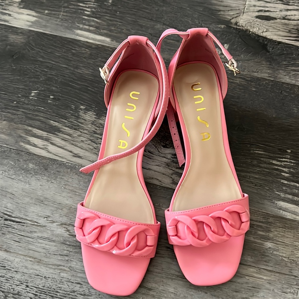 Pink ankle strap shoes.